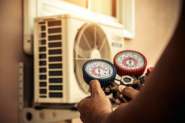 Professional Air Conditioning Service technician working in Greensboro, GA